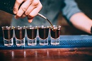 picture of bartender pouring shots