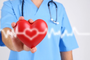 doctor holding heart
