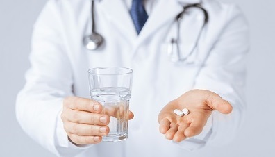 doctor with pills