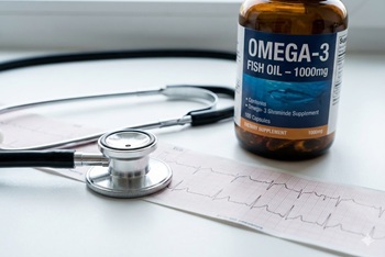 fish oil bottle and stethoscope