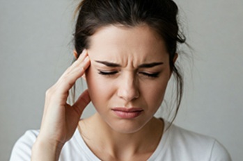 woman with migraine headache