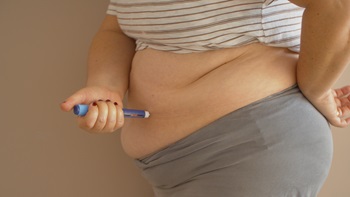 obese women injecting drug