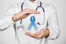 picture of doctor holding prostate cancer ribbon